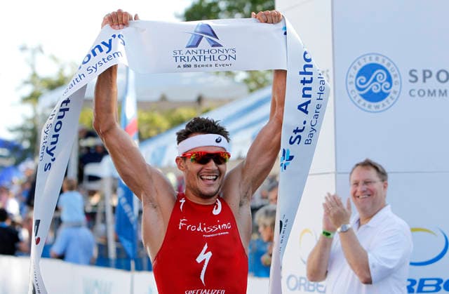 April 28, 2013 - St. Petersburg, Florida, U.S. - JAMES BORCHUCK Times ..Jan Frodeno celebrates his St. Anthony s win as Mayor Bill Foster applauds in the backround at the finish line. Copyright: xJamesxBorchuckx