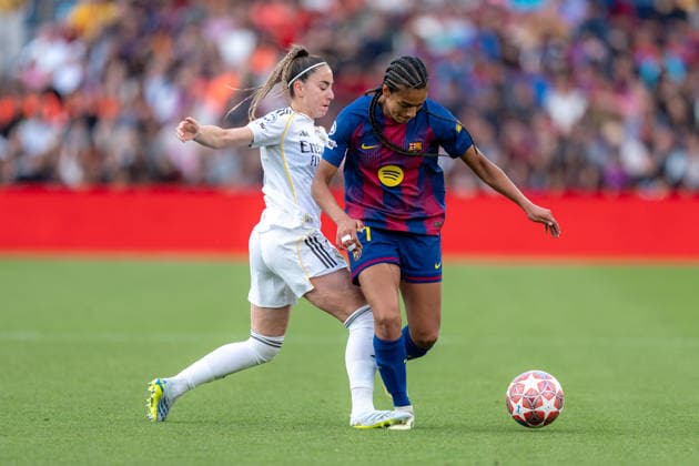 Spain-Football-Women Champions League - FC Barcelona, Barca v Real Madrid CF in Barcelona, Spain. Barcelona, Spain, 2, April, 2026. FC Barcelona player (24) Esmee Brugts vies with Athenea del Castillo (7) during Women Champions League match between FC Barcelona and Real Madrid CF in Spotify Camp Nou Stadium, Barcelona, Spain, on April 2, 2026. Barcelona Spotify Camp Nou Stadium Barcelona Spain