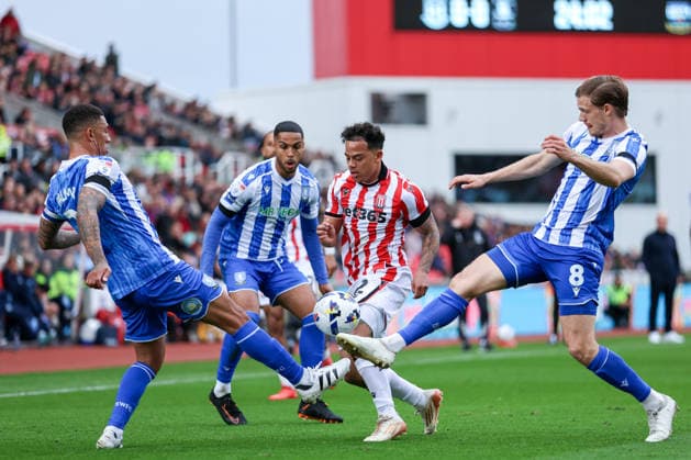 3rd April 2026; Bet365 Stadium, Stoke, Staffordshire, England; EFL Championship Football, Stoke City versus Sheffield Wednesday; Million Manhoef of Stoke City being challenged by Svante Ingelsson and Liam Palmer of Sheffield Wednesday AidanxHunter Content restricted for UK based newspaper