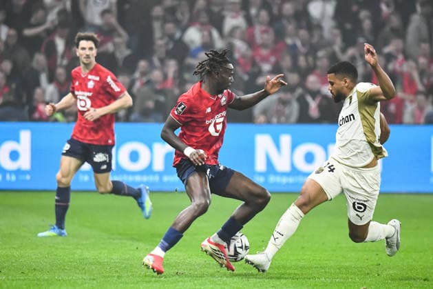 FOOTBALL : Lille OSC vs RC Lens - Ligue 1 - JournÃ e 28 - 04 04 2026 Ngal™ayel Mukau (Lille OSC) Matthieu Udol (RC Lens) LilleFrance  Copyright: xBaptistexAutissierx