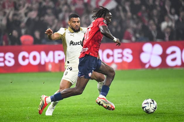 FOOTBALL : Lille OSC vs RC Lens - Ligue 1 - JournÃ e 28 - 04 04 2026 Ngal™ayel Mukau (Lille OSC) Matthieu Udol (RC Lens) LilleFrance  Copyright: xBaptistexAutissierx