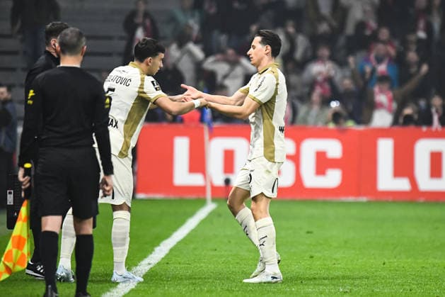 FOOTBALL : Lille OSC vs RC Lens - Ligue 1 - JournÃ e 28 - 04 04 2026 Florian Thauvin (RC Lens) Andrija Bulatovic (RC Lens) LilleFrance  Copyright: xBaptistexAutissierx