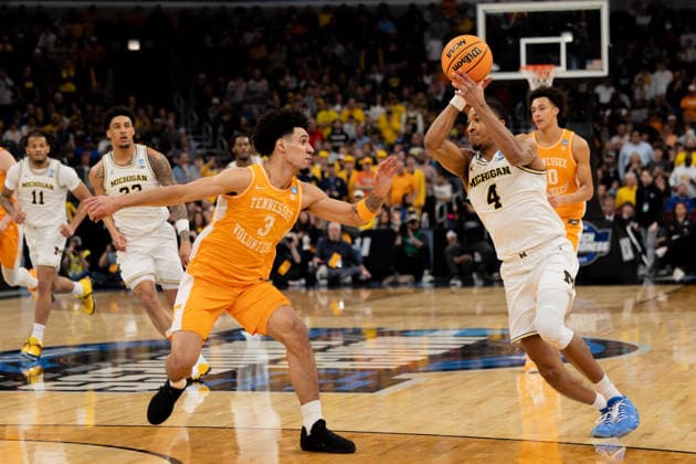 Michigan Wolverines Vs Tennessee Volunteers in Chicago, US - 29 Mar 2026 Nimari Burnett (R) of the Michigan Wolverines in action against Bishop Boswell (L) of the Tennessee Volunteers in the Elite Eight round of the NCAA, College League, USA Men s Basketball Tournament at the United Center. Final score; Michigan 95-62 Tennessee. Chicago United States Copyright: xNicholasxMullerx xSOPAxImagesx NMULLER_MICH_TENN_NCAAELITE8(18)
