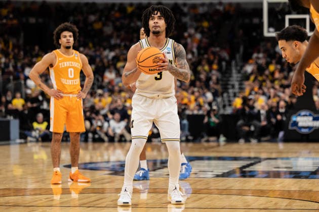 March 29, 2026, Chicago, Illinois, United States: Eliot Cadeau of the Michigan Wolverines in action against the Tennessee Volunteers in the Elite Eight round of the NCAA, College League, USA Men s Basketball Tournament at the United Center. Final score; Michigan 95-62 Tennessee. Chicago United States - ZUMAs197 20260329_aaa_s197_901 Copyright: xNicholasxMullerx