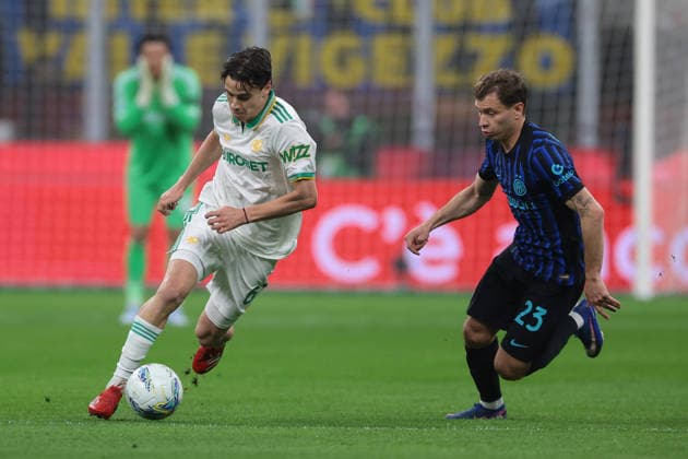 Milan, Italy, 5th April 2026. Niccolo Pisilli of AS Roma is pursued by Nicolo Barella of FC Internazionale during the Internazionale vs AS Roma Serie A match at Giuseppe Meazza, Milan. Picture credit should read: Jonathan Moscrop Sportimage EDITORIAL USE ONLY. No use with unauthorised audio, video, data, fixture lists, club league logos or live services. Online in-match use limited to 120 images, no video emulation. No use in betting, games or single club league player publications. SPI_013_JM_INTER_ROMA SPI-4643-0013
