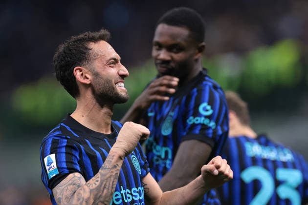 Milan, Italy, 5th April 2026. Marcus Thuram of FC Internazionale celebrates with team mate Hakan Calhanoglu after scoring to give the hosts a 4-1 lead during the Internazionale vs AS Roma Serie A match at Giuseppe Meazza, Milan. Picture credit should read: Jonathan Moscrop Sportimage EDITORIAL USE ONLY. No use with unauthorised audio, video, data, fixture lists, club league logos or live services. Online in-match use limited to 120 images, no video emulation. No use in betting, games or single club league player publications. SPI_071_JM_INTER_ROMA SPI-4643-0071
