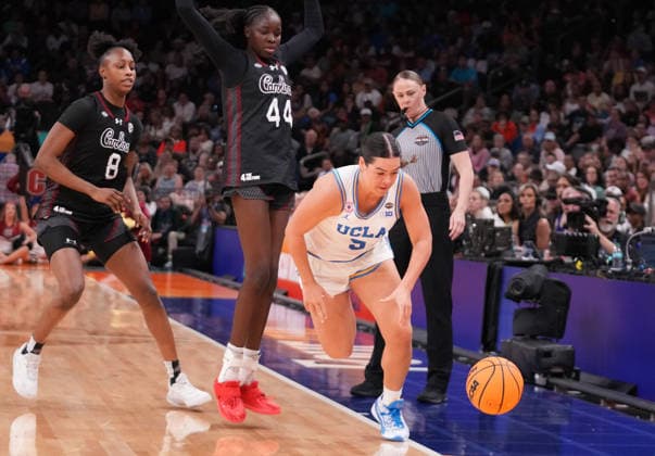 UCLA guard Charlisse Leger-Walker (5) chases down the ball past South Carolina forward Joyce Edwards (8) and guard Agot Makeer (44) in the second half of the Finals of the 2026 NCAA, College League, USA Women s Basketball Tournament at Mortgage Matchup Center in Phoenix, Arizona, on Sunday, April 5, 2026.  AZP20260405937 DARRYLxWEBB