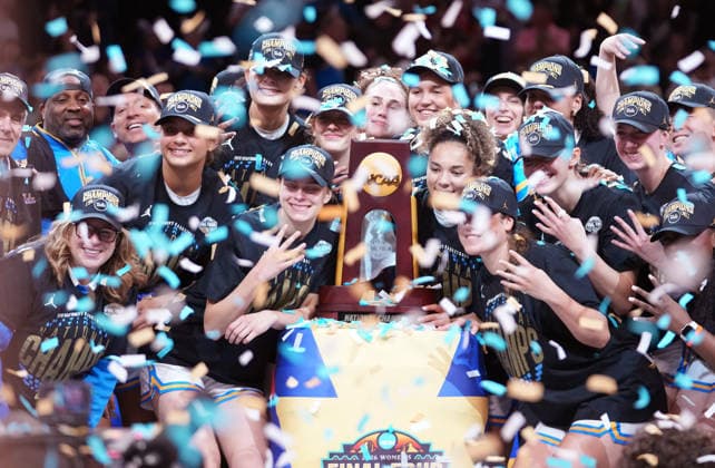 UCLA players and head coach head coach Cori Close celebrate after defeating South Carolina in the Finals of the 2026 NCAA, College League, USA Women s Basketball Tournament at Mortgage Matchup Center in Phoenix, Arizona, on Sunday, April 5, 2026. UCLA defeated South Carolina 79-51 to win their first-ever women s NCAA Tournament championship.  AZP20260405980 DARRYLxWEBB