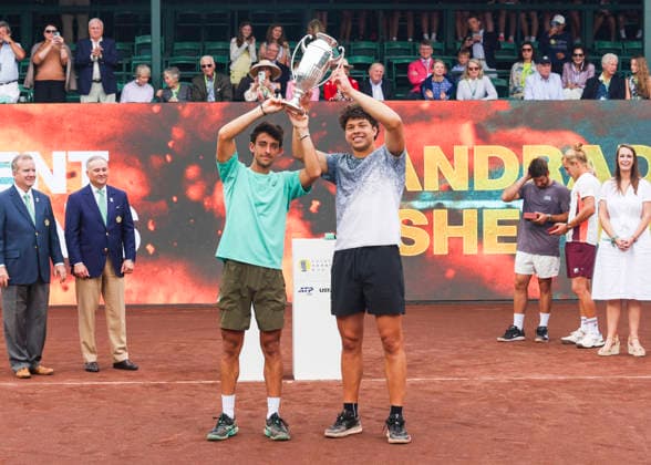 HOUSTON, TX - APRIL 05: (left to right) Andres Andrade (ECU) and Ben Shelton (USA) hold up the winners™ trophy during the doubles finals of the Men™s Clay Court Championship on April 5, 2026 at River Oaks Country Club in Houston, Texas. (Photo by Leslie Plaza Johnson Icon Sportswire) TENNIS: APR 05 US Men s Clay Court Championship EDITORIAL USE ONLY Icon260405104
