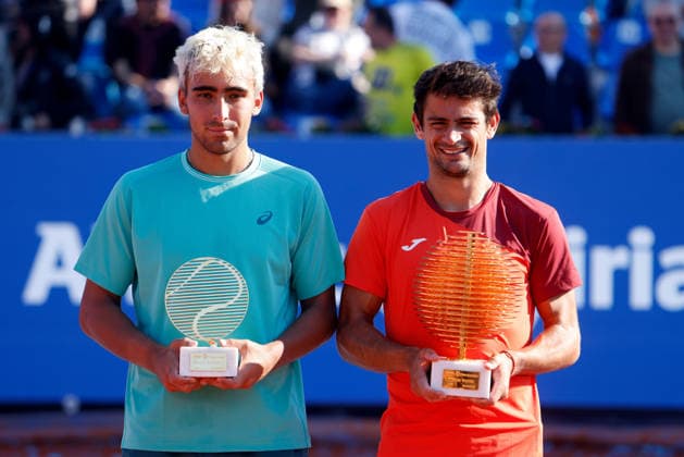 (260406) -- BUCHAREST, April 6, 2026 -- Mariano Navone (R) of Argentina and Daniel Merida of Spain pose with the trophy after the final match of the ATP, Tennis Herren 250 Tiriac Open tennis tournament in Bucharest, Romania, April 5, 2026. (Photo by Xinhua) (SP)ROMANIA-BUCHAREST-TENNIS-ATP 250 TIRIAC OPEN CristianxCristel 