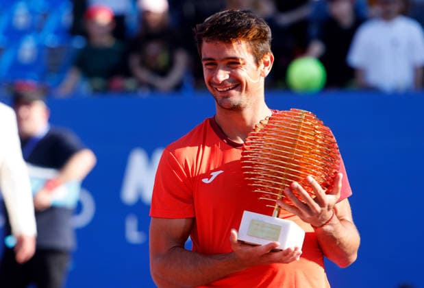(260406) -- BUCHAREST, April 6, 2026 -- Mariano Navone of Argentina celebrates with the trophy after winning the final match against Daniel Merida of Spain at the ATP, Tennis Herren 250 Tiriac Open tennis tournament in Bucharest, Romania, April 5, 2026. (Photo by Xinhua) (SP)ROMANIA-BUCHAREST-TENNIS-ATP 250 TIRIAC OPEN CristianxCristel 
