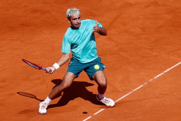 (260406) -- BUCHAREST, April 6, 2026 -- Daniel Merida of Spain returns the ball to Mariano Navone of Argentina during the final match of ATP, Tennis Herren 250 Tiriac Open tennis tournament in Bucharest, Romania, April 5, 2026. (Photo by Xinhua) (SP)ROMANIA-BUCHAREST-TENNIS-ATP 250 TIRIAC OPEN CristianxCristel 