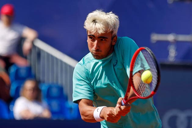 (260406) -- BUCHAREST, April 6, 2026 -- Daniel Merida of Spain returns the ball to Mariano Navone of Argentina during the final match of ATP, Tennis Herren 250 Tiriac Open tennis tournament in Bucharest, Romania, April 5, 2026. (Photo by Xinhua) (SP)ROMANIA-BUCHAREST-TENNIS-ATP 250 TIRIAC OPEN CristianxCristel 