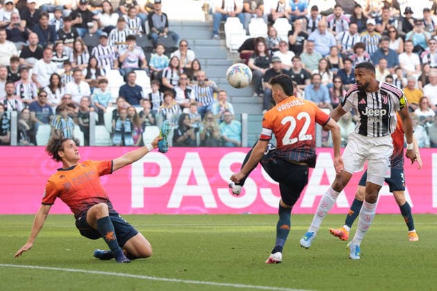 Turin, Italy, 6th April 2026. Gleison Bremer of Juventus scores to give the hosts a 1-0 lead as Lorenzo Colombo of Genoa CFC holds his football boot in his hand as he tries to block the effort during the Juventus vs Genoa Serie A match at Allianz Stadium, Turin. Picture credit should read: Jonathan Moscrop Sportimage EDITORIAL USE ONLY. No use with unauthorised audio, video, data, fixture lists, club league logos or live services. Online in-match use limited to 120 images, no video emulation. No use in betting, games or single club league player publications. SPI_001_JM_JUVE_GENOA SPI-4644-0001