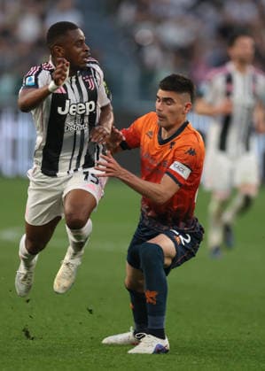 Turin, Italy, 6th April 2026. Pierre Kalulu of Juventus hurdles Johan Vasquez of Genoa CFC during the Juventus vs Genoa Serie A match at Allianz Stadium, Turin. Picture credit should read: Jonathan Moscrop Sportimage EDITORIAL USE ONLY. No use with unauthorised audio, video, data, fixture lists, club league logos or live services. Online in-match use limited to 120 images, no video emulation. No use in betting, games or single club league player publications. SPI_088_JM_JUVE_GENOA SPI-4644-0088