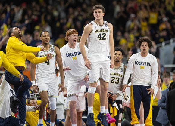 April 6, 2026, Indianapolis, Indiana, USA: Michigan celebrates during the closing seconds as they defeat the UConn Huskies for the NCAA, College League, USA Mens Basketball Championship, 69-63. Monday, April 7, 2026. Indianapolis USA - ZUMAr44_ 20260406_zsp_r44_005 Copyright: xThomasxJ.xRussox