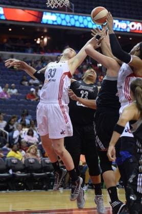 June 29, 2014 - Washington, DC, USA - Washington Mystics center Emma Meesseman (33) grabs a rebound against San Antonio Stars forward Danielle Adams (23) and Stars center Jayne Appel (32) in the third quarter at the Verizon Center in Washington, Sunday, June 29, 2014. The Stars defeated the Mystics, 73-65. Copyright: xChuckxMyersx