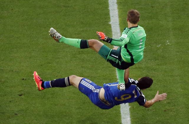 July 13, 2014 - Rio De Janeiro, BRAZIL - Germany s goalkeeper Manuel Neuer falls over Argentina s Gonzalo Higuain during the World Cup final soccer match between Germany and Argentina at the Maracana Stadium in Rio de Janeiro, Brazil, Sunday, July 13, 2014. Copyright: xFabrizioxBensch Poolx