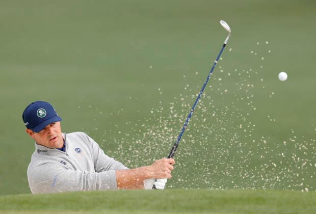 Bryson DeChambeau hits out of a bunker to the 2nd hole during a practice round on the Tuesday before The Masters Tournament at Augusta National Golf Club on Tuesday, April 7, 2026 in Augusta, Georgia.  AUG20260407114 JOHNxANGELILLO