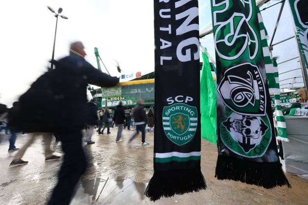 Sporting scarves on sale prior the kick off Sporting v Arsenal, UEFA Champions League, Quarter Final, First Leg, Football, Estadio Jose Alvalade, Lisbon, Portugal - 07 Apr 2026Lisbon Estádio José Alvalade Portugal EDITORIAL USE ONLY No use with unauthorised audio, video, data, fixture lists, club league logos or live services. Online in-match use limited to 120 images, no video emulation. No use in betting, games or single club league player publications.  Copyright: xMichaelxZemanek Shutterstockx 16811860b
