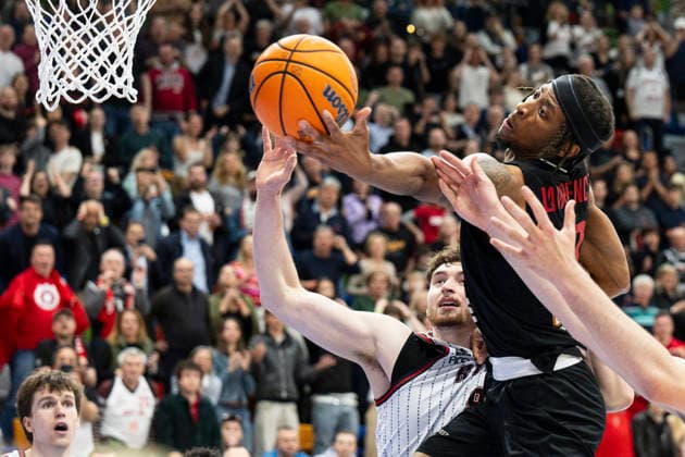 Quarter-final of men s basketball Champions League, 2nd game: Nymburk vs Rytas Vilnius in Prague, Czech Republic, April 7, 2026. From right Jaquan Lawrence of Nymburk, Kay Bruhnke of Vilnius. (CTKxPhoto MichalxKamaryt) CTKPhotoP2026040707368  CTKPhotoP2026040707368