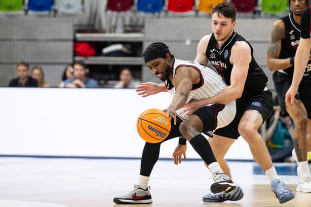 Quarter-final of men s basketball Champions League, 2nd game: Nymburk vs Rytas Vilnius in Prague, Czech Republic, April 7, 2026. From left Jerrick Harding of Vilnius, Frantisek Rylich of Nymburk. (CTKxPhoto MichalxKamaryt) CTKPhotoP2026040707472  CTKPhotoP2026040707472