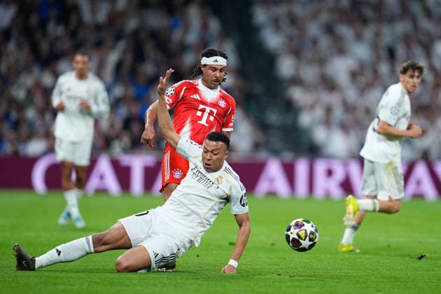 April 7, 2026, Madrid, Madrid, Spain: Serge Gnabry of Bayern Munich and Kylian Mbappe of Real Madrid CF compete for the ball during the UEFA Champions League 2025 26 Quarter-finals First Leg match between Real Madrid C.F. and Bayern Munich at Bernabeu stadium on April 07, 2026, in Madrid, Spain. Real Madrid C.F. V Bayern Munich - UEFA Champions League 2025 26 Quarter-Finals First Leg  - ZUMAa181 20260407_zaa_a181_338 Copyright: xDennisxAgyemanx