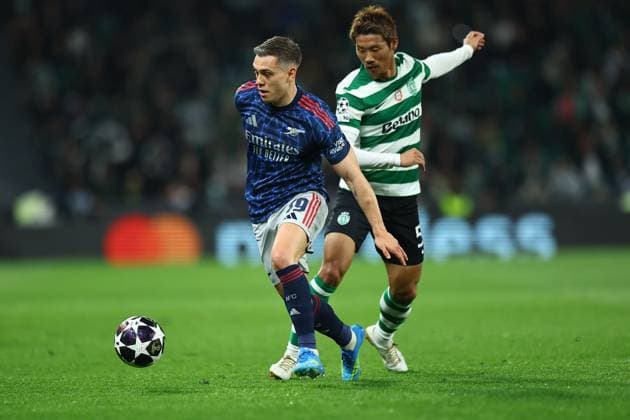 Leandro Trossard of Arsenal and Hidemasa Morita of Sporting Sporting v Arsenal, UEFA Champions League, Quarter Final, First Leg, Football, Estadio Jose Alvalade, Lisbon, Portugal - 07 Apr 2026Lisbon Estádio José Alvalade Portugal EDITORIAL USE ONLY No use with unauthorised audio, video, data, fixture lists, club league logos or live services. Online in-match use limited to 120 images, no video emulation. No use in betting, games or single club league player publications.  Copyright: xMichaelxZemanek Shutterstockx 16811860q