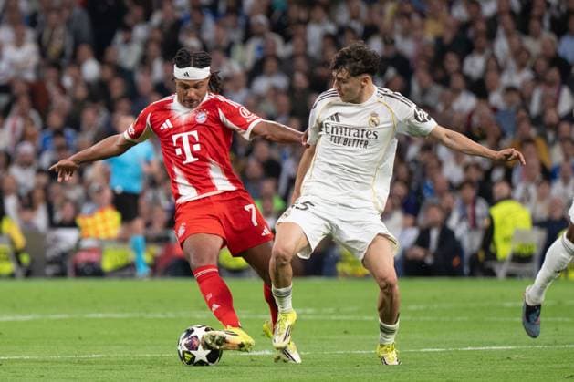 Serge Gnabry 7 (FC Bayern Muenchen), im Zweikampf, Aktion, Real Madrid vs. FC Bayern Muenchen Fussball, Champions League, Viertelfinale, 07.04.2026 Madrid Madrid Spanien