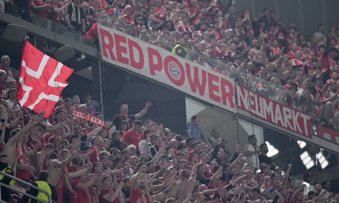 FUSSBALL CHAMPIONS LEAGUE SAISON 2025 2026 Viertelfinal Hinspiel 07.04.2026 Real Madrid - FC Bayern Muenchen Jubel nach dem Tor zum 0 - 2, FC Bayern Muenchen Fans in der Fankurve