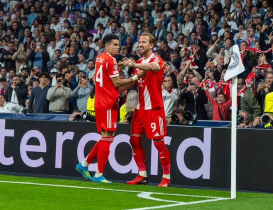 07.04.2026, Fussball UEFA Championsleague 2025 2026: Viertelfinale, Real Madrid - FC Bayern München, im Estadio Bernabeu in Madrid (Spanien), Torjubel zum 2:0 Harry Kane (re, FC Bayern München), Luis Diaz (FC Bayern München),