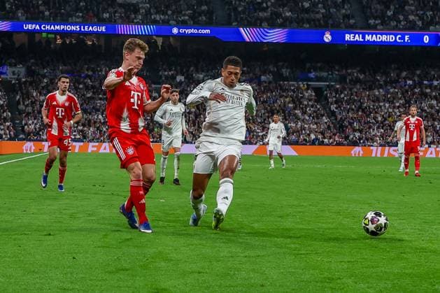 Joshua Kimmich 6 (FC Bayern Muenchen) in Aktion gegen Jude Bellingham 5 (Real Madrid), Real Madrid vs. FC Bayern Muenchen, Fussball, Maenner, UEFA Champions League, Saison 2025 2026, Viertelfinal-Hinspiel (Quarter Finals 1st Leg), 07.04.2026 Madrid Madrid Spanien