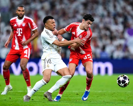 ESP: Real Madrid v Bayern Munich. UEFA Champions League. Quarter-Finals, First Leg. Kylian Mbappe of Real Madrid CF and Aleksandar Pavlovic of FC Bayern Munchen during the UEFA Champions League match, between Real Madrid and Bayern Munich, Quarter-Finals, first leg, played at Santiago Bernabeu Stadium on April 7, 2026 in Madrid, Spain. Copyright: xCesarxCebollax xPRESSINPHOTOx PS_260407_RMA_BAY_2526_117