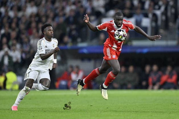 Real Madrid v Bayern Munich - UEFA Champions League MADRID, SPAIN - APRIL 07: Real Madrid s Vinicius Junior (L) competes with his opponent Dayot Upamecano (R) during the UEFA Champions League first leg quarter-final match between Real Madrid and Bayern Munich at Bernabeu Stadium in Madrid, Spain on April 07, 2026. Burak Akbulut Anadolu Madrid Spain. Editorial use only. Please get in touch for any other usage.  Copyright: x2026xAnadoluxBurakxAkbulutx