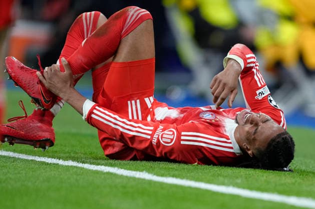 April 7, 2026, Madrid, Madrid, Spain: Michael Olise of Bayern Munich hurts during the UEFA Champions League 2025 26 Quarter-finals First Leg match between Real Madrid C.F. and Bayern Munich at Bernabeu stadium on April 07, 2026, in Madrid, Spain. Real Madrid C.F. V Bayern Munich - UEFA Champions League 2025 26 Quarter-Finals First Leg  - ZUMAa181 20260407_zaa_a181_506 Copyright: xOscarxJ.xBarrosox