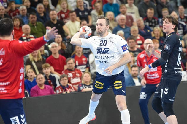Handball I Herren I Saison 2025-2026 I EHF European League I Playoffs I Rückspiel I SG Flensburg-Handewitt - Skanderborg Aarhus Handball I 07.04.2026 von links Benjamin Buric (1, SG Flensburg-Handewitt), Morten Balling Christensen (20, SAH), Lasse Möller (64, SG Flensburg-Handewitt) Copyright: xLobeca JanxKirschnerx