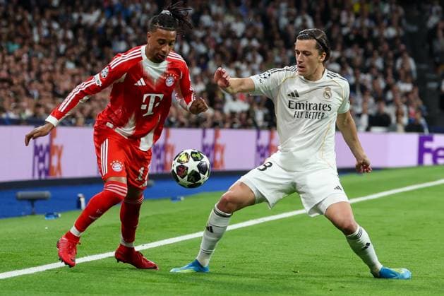 Aktion zwischen Michael Olise 17 (FC Bayern Muenchen) und Alvaro Fernandez Carreras 18 (Real Madrid), Real Madrid vs. FC Bayern Muenchen, Fussball, Maenner, UEFA Champions League, Saison 2025 2026, Viertelfinal-Hinspiel (Quarter Finals 1st Leg), 07.04.2026 Madrid Madrid Spanien