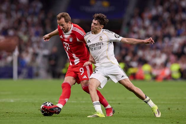 Real Madrid CF Vs FC Bayern Munchen in Madrid - 07 Apr 2026 Harry Kane (L) of FC Bayern Munchen and Thiago Pitarch (R) of Real Madrid CF are seen in action during the UEFA Champions League 2025 2026 quarter-finals first leg football match between Real Madrid CF and FC Bayern Munchen at Santiago Bernabeu stadium. Final score Real Madrid CF 1:2 FC Bayern Munchen Madrid Spain Copyright: xFedericoxTitonex xSOPAxImagesx FTITONE_017
