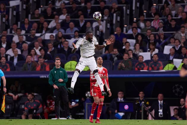 April 7, 2026, Madrid, Spain: Antonio Rudiger (L) of Real Madrid CF and Michael Olise (R) of FC Bayern Munchen are seen in action during the UEFA Champions League 2025 2026 quarter-finals first leg football match between Real Madrid CF and FC Bayern Munchen at Santiago Bernabeu stadium. Final score Real Madrid CF 1:2 FC Bayern Munchen Madrid Spain - ZUMAs197 20260407_aaa_s197_230 Copyright: xFedericoxTitonex