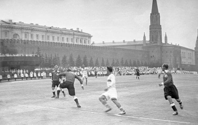 Moscow, USSR. Participants in a demonstration match between the main and reserve squads of the Spartak football team play in Red Square as part of the All-Union Parade of Athletes. Emmanuil Yevzerikhin TASS  91027303