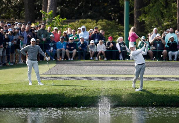 Rory McIlroy of Northern Ireland and Matt Fitzpatrick of England skip balls off of the water in front of the 16th green during a practice round on the Wednesday before The Masters Tournament at Augusta National Golf Club on Wednesday, April 8, 2026 in Augusta, Georgia.  AUG20260408106 JOHNxANGELILLO