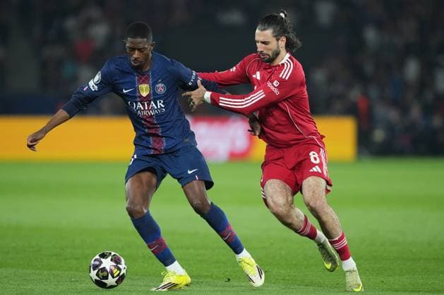 Ousmane Dembele of PSG and Dominik Szoboszlai of Liverpool Paris Saint-Germain v Liverpool, UEFA Champions League, Quarter Final, First Leg, Football, Parc des Princes, Paris, France - 08 Apr 2026Paris Parc des Princes France EDITORIAL USE ONLY No use with unauthorised audio, video, data, fixture lists, club league logos or live services. Online in-match use limited to 120 images, no video emulation. No use in betting, games or single club league player publications. Copyright: xDavexWinter Shutterstockx 16811861ai