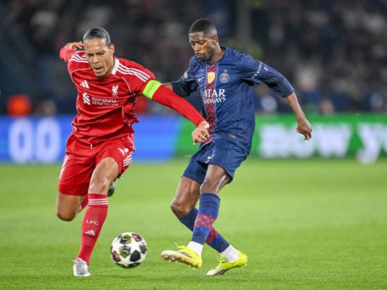 Virgil van Dijk (Liverpool FC) and Ousmane Dembele (Paris Saint-Germain FC) battle for the ball during the UEFA Champions League 2025 26 Quarter-Final First Leg match between Paris Saint-Germain FC and Liverpool FC at Parc des Princes on April 8, 2026 in Paris, France. (Photo by Harry Langer DeFodi Images) -