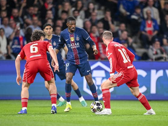 Milos Kerkez (Liverpool FC), Ousmane Dembele (Paris Saint-Germain FC) and Alexis Mac Allister (Liverpool FC) battle for the ball during the UEFA Champions League 2025 26 Quarter-Final First Leg match between Paris Saint-Germain FC and Liverpool FC at Parc des Princes on April 8, 2026 in Paris, France. (Photo by Harry Langer DeFodi Images) -