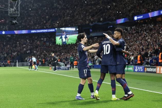 Ligue des Champions Psg Liverpool PHOTOPQR LE PARISIEN LP Fred Dugit ; Paris ; 08 04 2026 ; Sports Parc des Princes, Paris (XVIe), le 08 04 2026 Quart de finale aller de ligue des Champions Psg-Liverpool LP Fred Dugit joie sur le but du 1-0 de Désiré Doué Ousmane Dembélé Vitinha -- 8 April 2026 Parc des Princes, Paris (16th arrondissement), France Champions League quarter-final first leg: PSG v Liverpool