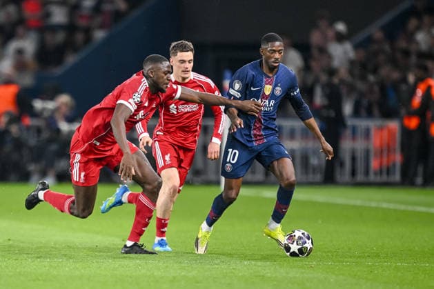 Ibrahima Konate (Liverpool FC), Florian Wirtz (Liverpool FC) and Ousmane Dembele (Paris Saint-Germain FC) battle for the ball during the UEFA Champions League 2025 26 Quarter-Final First Leg match between Paris Saint-Germain FC and Liverpool FC at Parc des Princes on April 8, 2026 in Paris, France. (Photo by Harry Langer DeFodi Images) -