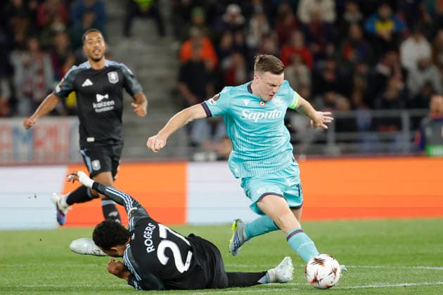 RECORD DATE NOT STATED 9th April 2026; Stadio Renato Dall Ara, Bologna, Italy, UEFA Europa League Football, Bologna versus Aston Villa; Morgan Rogers of Aston Villa FC under pressure from Lewis Ferguson of Bologna FC EmanuelexPennacchio
