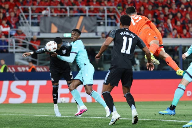 Ezri Konsa of Aston Villa FC scores the goal of 1-1 during the UEFA Europa League 2025 2026 football match between Bologna FC and Aston Villa FC at Renato dall Ara stadium in Bologna (Italy), April 09th, 2026. cesarexpurini