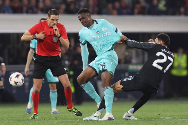 CALCIO - UEFA Europa League - Bologna FC vs Aston Villa FC Bologna, Italy - April 9, 2026: Jhon Lucumi (Centre-back) of Bologna FC 1909, Morgan Rogers (Forward) of Aston Villa seen in action during the UEFA Europe League 2025 2026, Round of 8 first leg, between Bologna FC 1909 vs Aston Villa FC at Renato Dall Ara in Bologna Bologna Italy  Copyright: xIPAxSport ABACAx