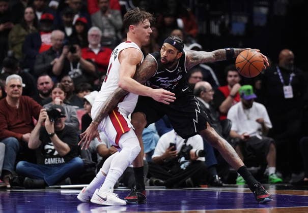 April 9, 2026, Toronto, On, CANADA: Toronto Raptors Brandon Ingram (right) protects the ball from Miami Heat s Pelle Larsson (9) during second half NBA, Basketball Herren, USA basketball action in Toronto on Thursday, April 9, 2026. Canada News - April 9, 2026  - ZUMAc35_ 20260409_zaf_c35_085 Copyright: xNathanxDenettex